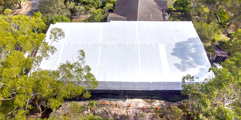 Most ambitious shrink wrap weather tent project - Castle Cove