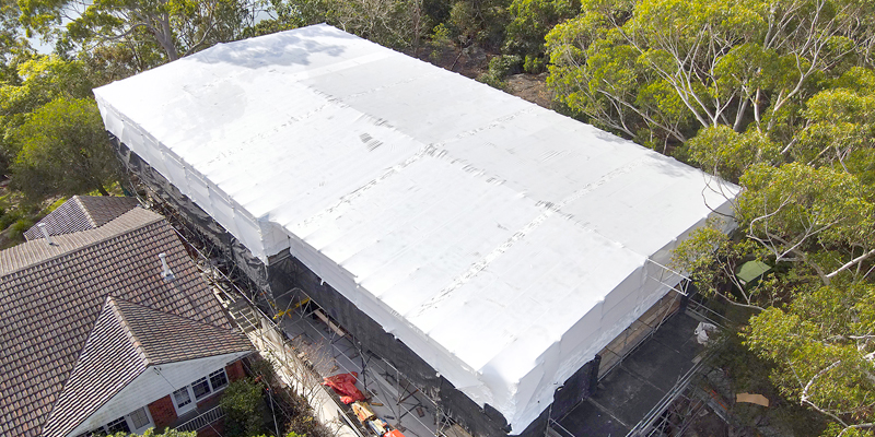 Shrink Wrap Scaffold Weather Tent - Castle Cove - Drone Footage